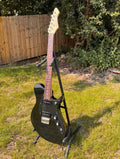 Kassie - black solid-body electric guitar